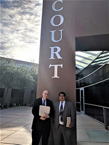 UA professor James Diamond and law student Pete Sabori are seen in front of the Pascua Yaqui Tribe courthouse, where students worked under Diamond's direction. UA professor James Diamond and law student Pete Sabori are seen in front of the Pascua Yaqui Tribe courthouse, where students worked under Diamond's direction.